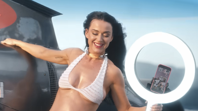 Katy Perry grins after stealing someone